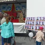 В Здвинске прошла фотовыставка в память об участниках СВО